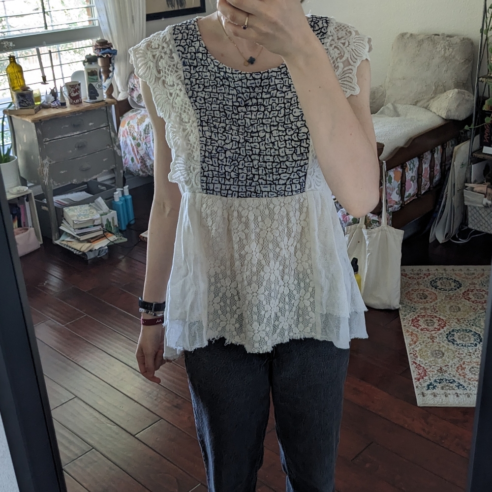 Anthropologie off white lacey blouse, with blue and black embroidery